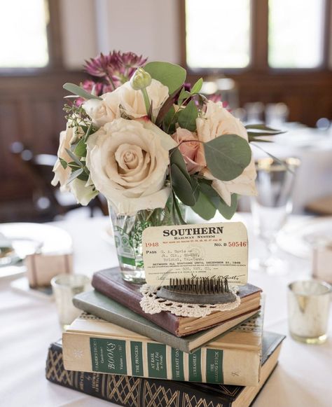 Books And Greenery Centerpieces, Book Floral Centerpieces, Books And Flowers Centerpiece, Book And Lantern Centerpieces, Book Theme Quinceanera, Book Table Centerpieces Wedding, Book Centerpiece Wedding, Book Centerpiece Ideas, Book Centrepiece Wedding