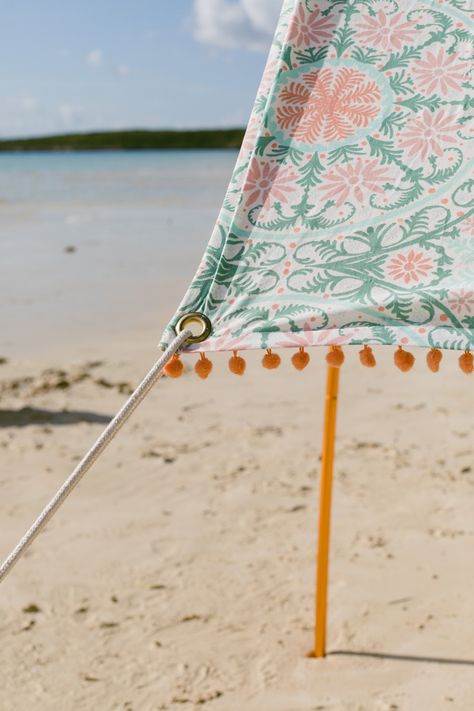 We are throwing shade on beach umbrellas today. This DIY beach tent gives so much more shade and you can make it using a shower curtain! Yep, shower curtains! #ruffledblog Diy Beach Canopy, Beach Tent Ideas, Diy Beach Umbrella, Diy Beach Tent, Tent Camping Ideas, Shower Curtains Ideas, Surprise Birthday Trip, Beach Shade Tent, Beach Tents