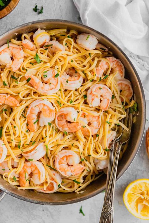 Tender shrimp, a light and lemony sauce, and perfectly cooked noodles combine in this recipe for Easy Shrimp Scampi Linguine. This absolutely delicious pasta dinner is ready in twenty minutes! It will be your new go-to weeknight meal in no time. Damn Delicious Shrimp Scampi, Shrimp Linguini, Shrimp Scampi Linguine, Easy Shrimp Scampi, Shrimp Linguine, Shrimp Scampi Recipe, Scampi Recipe, Frozen Shrimp, Delicious Pasta