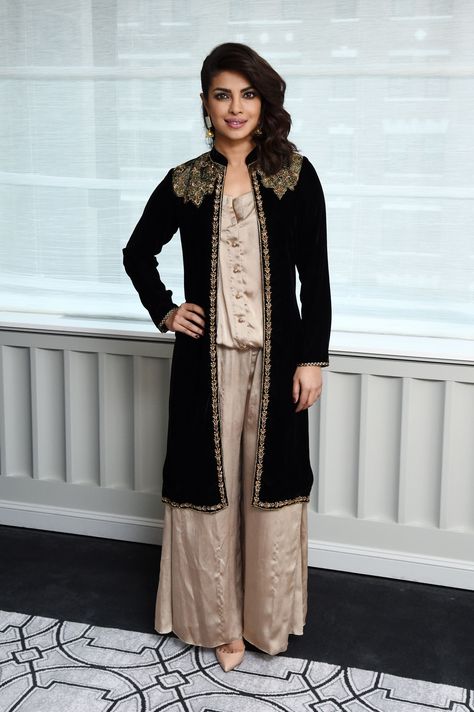 At the Bajirao Mastani New York press junket.   - ELLE.com Long Net Shrug Design, Net Shrug Design, Net Shrug, Shrug Design, Embellished Coat, Shrug For Dresses, Velvet Dress Designs, Diana Penty, Mode Kimono