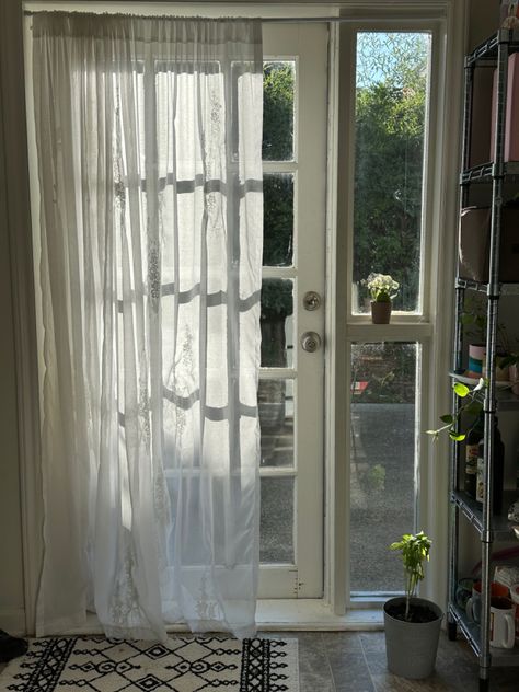 Home 
House decor 
White sheet curtain 
Large patio door 
Door 
Curtain
Plant 
Setup Balcony Sheer Curtains Apartment, Mesh Curtains Bedroom Aesthetic, Hallway Curtains, White Mesh Curtains, Venice Bungalow, Sheer White Curtains, White Lace Curtains Aesthetic, Sheer White Curtains Aesthetic, Glass Door Curtains