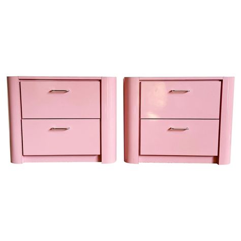 Add a splash of modernity to your bedroom with these Postmodern Pink Lacquer Laminate Nightstands with Chrome Handles. The bold pink hue and sleek chrome handles create a striking contrast, offering a playful yet sophisticated look. Equipped with drawers for storage, these nightstands combine practicality with contemporary style, perfect for those who love vibrant and functional bedroom furniture. Vintage pieces may have age-related wear. Review photos carefully, ask questions, request more imag Pink Nightstands, Card Game Table, Tea Cup Art, Bar Dining Table, Hanging Floor Lamp, Bedside Storage, Nightstand Storage, Set Decor, Modern Bedroom Decor