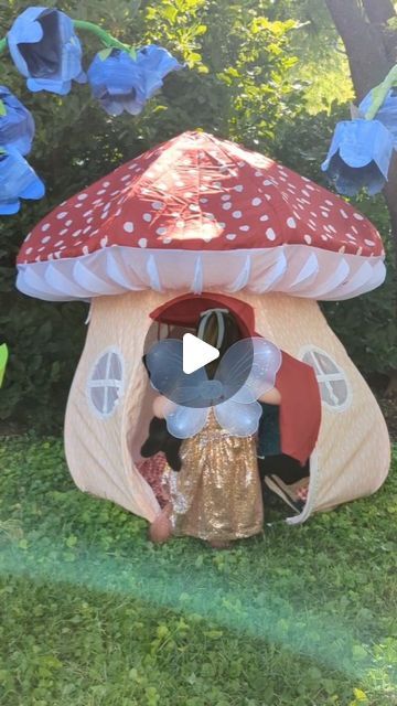 Jen Buchheit on Instagram: "Fairy Birthday Party 🍄

Celebrating three magical years with Mae! 

For Mae's fairy themed birthday, I created giant bluebell flowers made with painted newspaper. I placed them around our backyard to make everything feel fairy sized. 

I made fairy houses out of cardboard, leaving the roofs open so they could hold pots of flowers. They made beautiful centerpieces for the table that could also be played with!

Playing in the kitchen is Mae's favorite right now, so I transformed our playhouse into a fairy kitchen for the party. I filled the shelves with real kitchen tools, spices, and potion bottles. The kids had so much fun mixing up fairy potions! 

#easycrafts #kidcrafts #playoutside #invitationtoplay #cardboardcrafts #papercrafts #fairyparty #paperflowers #di Milk Carton Fairy House, Paint A Fairy House Party, Painted Newspaper, Diy Fairy House From Plastic Bottles, Paola Cottage Fairy, Fairy Kitchen, Fairy Themed Birthday, Pots Of Flowers, The Cottage Fairy Paola Art