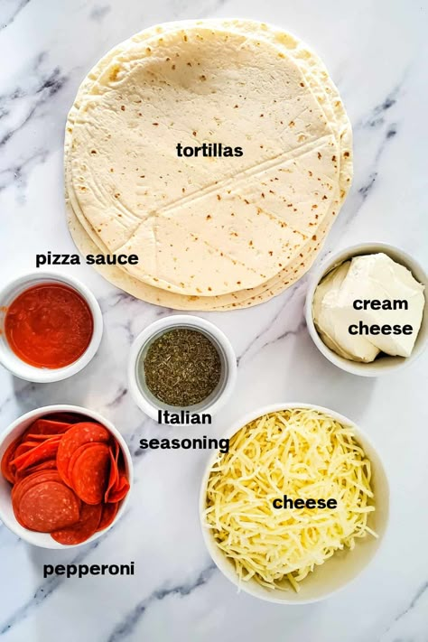 These Easy Pepperoni Pizza Tortilla Pinwheels are the perfect appetizer for a party or game day. Made with just a few simple ingredients and simple to make ahead. So delicious too! Pepperoni Rolls With Tortillas, Pepperoni Roll Ups Tortilla, Tortilla Pizza Roll Ups, Pepperoni Appetizers, Pinwheel Appetizers Easy, Pepperoni Pinwheels, Easy Pepperoni Pizza, Cream Cheese Pizza, Tortilla Hack