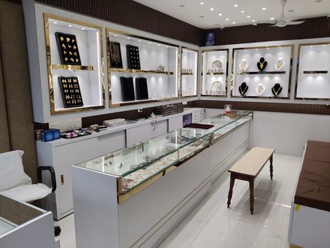 Jewellery shop Jewellery Shop Board Design, Small Jwellary Shop Interior, Jewellery Showroom Interiors Jewelry Shop, Jewellery Counter Design, Small Gold Shop Interior Design, Small Jewelry Shop Interior Design, Small Jewellery Shop Design, Jewellery Store Interior, Jewellery Shop Counter