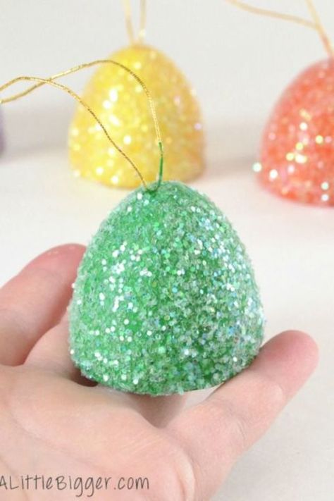 If your tree is in desperate need of some color, turn it into a Candy Land-themed world of wonder with these sugared gum drops made from cardboard Easter eggs. Get the tutorial here. Gumdrop Ornaments, Easter Tree Ornaments, Candy Christmas Tree, Gingerbread Christmas Decor, Diy Christmas Ornaments Easy, Candy Ornaments, Candy Decorations, Candy Christmas Decorations, Easy Christmas Diy