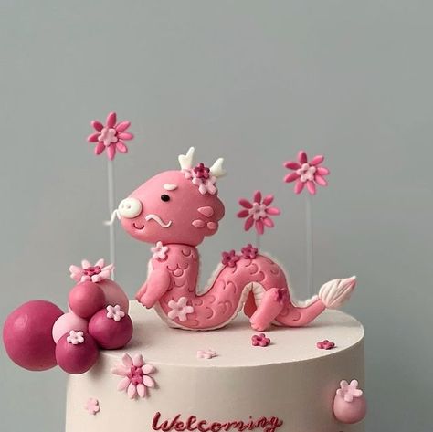 Korean Inspired Cake on Instagram: "Welcoming the year of the dragon 🐉🤍 Hopefully we get to make lots of dragon cake this year.  Design by request.  Same day orders are accepted for payment before 15.00 p.m except on Saturday & Sunday.   ☏ Click the link in BIO to order via Whatsapp.  Price is in story highlights.  Kapuk, North Jakarta, 14460." Welcome Baby Cake, Dragon Baby Shower Cake, Baby Shower Dragon Theme, Dragon Theme Nursery Baby Boy, Dragon Baby Nursery, Baby Boy Dragon Nursery, Dragon Cakes, Dragon Cake, Year Of The Dragon