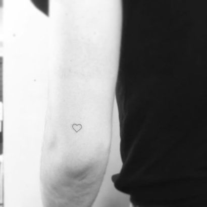 12 Tiny tattoos for your next tattoo inspiration Heart Tattoo On Back, Tattoo On Back Of Arm, Small Heart Tattoo, Above Elbow Tattoo, Little Heart Tattoos, Tricep Tattoos, Left Arm Tattoos, Tattoo On Back, Back Of Arm Tattoo