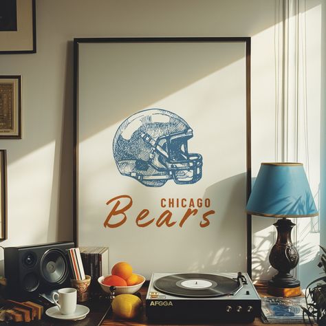 Introducing our Minimalist Chicago Bears Wall Art featuring a sleek design of a helmet! This is a perfect piece for any office, man cave or sports bar! --- ☞ More Activity & Place prints: https://www.etsy.com/au/shop/FunkyWallsStudio?ref=seller-platform-mcnav&section_id=48514629 DIGITAL FILE SIZES INCLUDED: 8x10, 12x16, 16x20, 18x24, 20x30, 24x36 ( can be resized further). ☞ After purchasing this artwork you will immediately receive your DOWNLOAD links on your invoice and via your confirmation e Sports Gallery Wall Man Caves, Mancave Wall Art, Sports Themed Living Room, Chicago Bears Bedroom Ideas, Mens Room Aesthetic, Teen Boy Wall Decor, Guys Apartment Decor, Chicago Bears Room, Vintage Sports Room