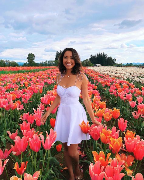 My Favorite Travels of 2018: Photos, Tips & the Best Places to Visit each Month Life With Jazz, Field Senior Pictures, Field Of Tulips, Farm Dress, Farm Pictures, Spring Photoshoot, Farm Clothes, Flower Photoshoot, Grad Photoshoot