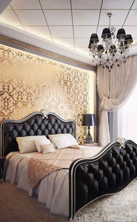 One of my favorite color schemes is black and gold, which is why I like this bedroom set up so much. This room features a beautiful gold patterned wall. Against it is an elegant black buttoned upholstered head and footboard. To top it off, there is that awesome fluffy carpet underneath everything. #bedroomsets Bedroom Light Ideas, Luxury Bedroom Interior Design, Luxury Bedroom Interior, Gold Room Decor, Cool Bed, French Country Bedroom, Black Bed Frame, Wood Bed Design, Bed Design Modern