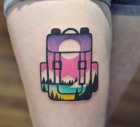 CafeMom.com : Nomad Travel Tattoo : 40 Travel Tattoos That Will Give You Serious Wanderlust -- These vibrant colors are so beautiful! The drawing of the actual backpack is very geometric and clean, but the color and the mountains inside of it take it to another level!