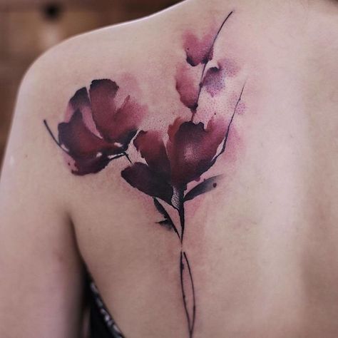 These Watercolor Tattoos By Chen Jie Will Make You Wish You Had One Black Watercolor Tattoo, Watercolor Tattoo Sleeve, Watercolor Tattoo Artists, Watercolour Tattoos, Sakura Tattoo, Magnolia Tattoo, Ribcage Tattoo, Watercolor Tattoo Flower, Muster Tattoos