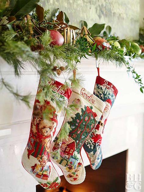 When it comes to fireplace Christmas decorations, take the opportunity to show off your favorite collectibles. This grouping of treasured stockings looks as good now as it did 20 years ago. Whole fruits intertwined with the green boughs add a pop of brightness. H R, Lush Christmas, Southern Christmas, Holiday Mantel, Christmas Fireplace Decor, Christmas Mantel Decorations, Christmas Fireplace, Christmas Mantels, The Night Before Christmas