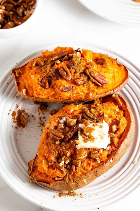 With crunchy pecans and a little bit of sweet brown sugar, these Twice Baked Sweet Potatoes will be your new favorite side dish at dinner. Whether you're making a casual Baked Sweet Potato Oven, Brown Sugar Sweet Potatoes, Sweet Potato Oven, Christmas Side Dish Recipes, Sweet Potato Recipes Roasted, Sweet Potato Recipes Baked, Twice Baked Sweet Potatoes, Baked Sweet Potatoes, Sweet Potato Cinnamon