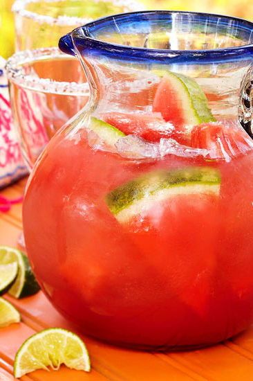 Classic pitcher cocktails like this Mexican Margarita is the perfect drink for a summer party. You can tweak the recipe and add watermelon or any fruit. #recipeideas #drinkrecipes #drinkideas #summer #bhg Bucket Of Margaritas, Large Batch Margaritas, Batch Margaritas, Summer Pitcher Cocktails, Mexican Margarita, Strawberry Sangria, Pitcher Drinks, Pitcher Cocktails, Sangria Cocktail