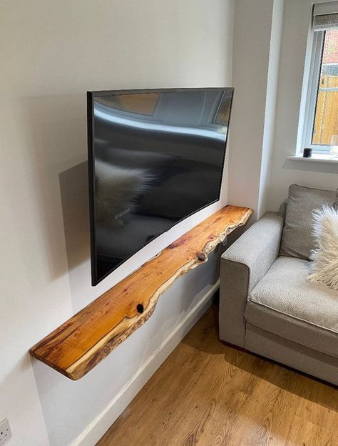 Floating Live Edge Shelf, What To Do With Live Edge Wood, Live Edge Floating Shelf Under Tv, Live Edge Tv Shelf, Live Edge Wood Floating Shelves, Wall Shelf Under Tv, Television Wall Ideas Mounted Tv, Live Edge Decor Ideas, Wood Slabs On Wall