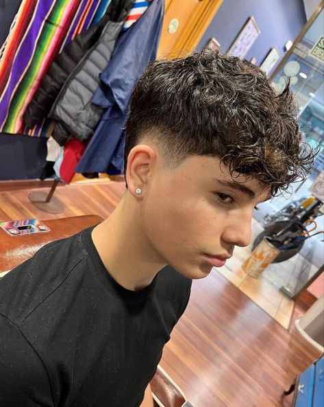 The Best V-Shaped Haircuts for Men Low Burst Fade Curly Hair, Burst Fade Wavy Hair, Low Burst Fade Haircut Mullet, Low Fade Mullet, Burst Fade Curly Hair, Low Burst Fade, Burst Fade Mullet, Burst Fade Haircut, Taper Fade Long Hair