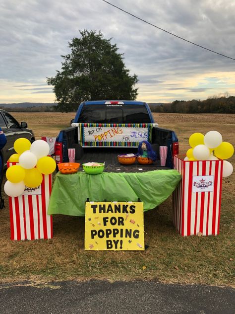 We used a cardboard box, white poster board and red duck tape for the popcorn boxes and yellow and white balloons tied together with kite string for popcorn. Popcorn Trunk Or Treat Ideas For Cars, Trunk Or Treat Concession Stand, Trunk Or Treat Popcorn Theme, Truck And Treat Ideas, Jesus Sweetest Name I Know Trunk, Lets Taco Bout Jesus Trunk Or Treat, Trunk Or Treat Ideas For Trucks Church, Trunk Or Treat Ideas For Suv Christian, Pickup Truck Trunk Or Treat Ideas