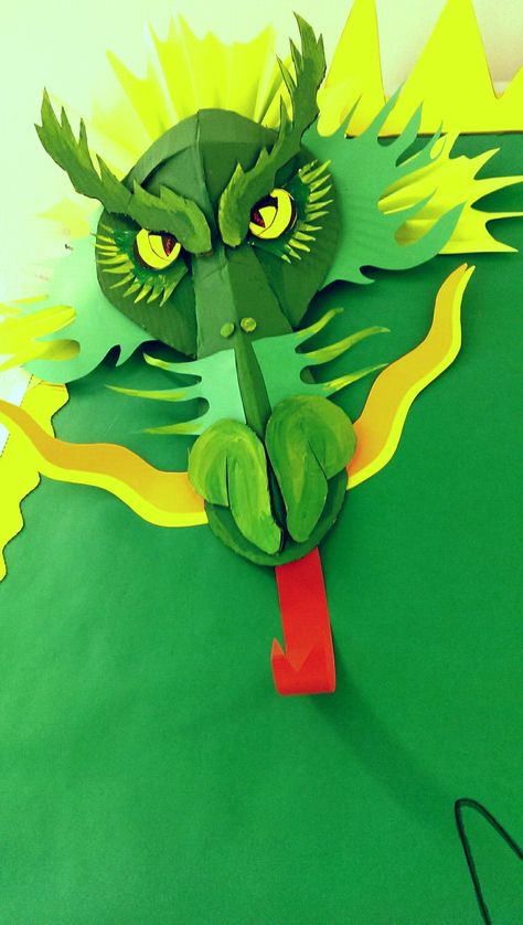 Maverick Dragons Bulletin Board. This intimidating Dragon was made from cardboard, paper and hot glue. Dragon Bulletin Board Ideas, Dragon Classroom, Dragon Display, Dragon Bulletin Board, Castle Classroom, Enchanted Forest Book, Chinese New Year Crafts, Dragon Crafts, Dragon Party