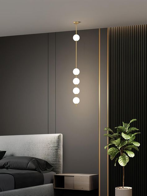 The Vertical Balls Pendant Lamp is like artwork hanging from the ceiling, adding a dreamlike feeling to the artist, and it brings enough light to illuminate any space. Adjustable height caters to your various design styles. Part functional lighting design, Vertical Balls Pendant Lamp  from a striking design ready to bring light and style to your home. 
 Featuring brass, this Pendant Lamp brings a transformative touch to your space. Easily installed in a variety of directions, this pendant lamp c Battery Pendant Light, Jubin Shah, Office Corner, Bedroom Colour, Corner Light, Wall Lamp Design, Led Desk Lamp, Pendant Lamps, Ball Pendant