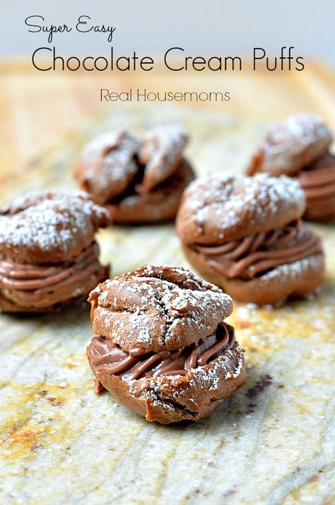 Super Easy Chocolate Cream Puffs | Real Housemoms | #chocolate #creampuffs #dessert Chocolate Cream Puffs, Chocolate Cream Puff, Cream Puff Recipe, Puff Recipe, Cream Puff, Cream Puffs, Chocolate Cream, Eclairs, Pastry Recipes