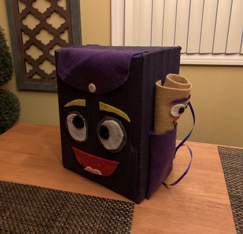 Use purple hockey tape to cover a cardboard box.... hot glue on felt accessories Hockey Tape, Explorer Backpack, Felt Accessories, Dora The Explorer, Hot Glue, Cardboard Box, Hockey, Glue, Felt