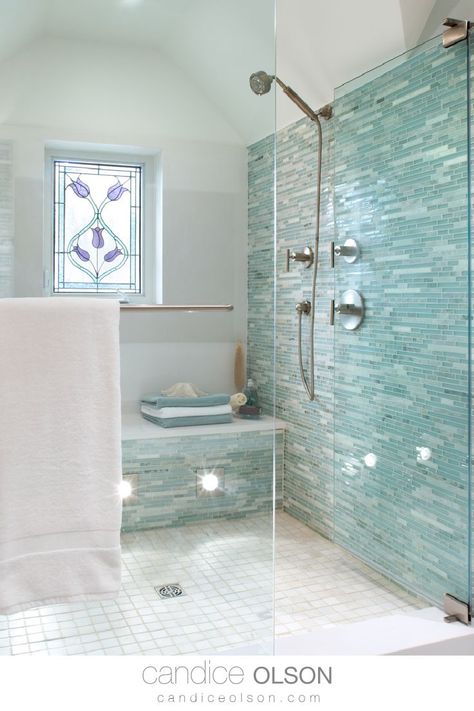 Stained Glass Window in the Shower • Frameless Glass Shower Design • Glass Mosaic Tile • Blue Tile • Shower Lighting • Shower Bench Seat • Waterproof Lights • Rain Shower Head #candiceolson #candiceolsondesign Enchanted Wallpaper, Sarah Brannon, Glass Tile Shower, Window In Shower, Candice Olson, Coastal Bathrooms, Bathroom Remodel Shower, Shower Remodel, Bathroom Renos