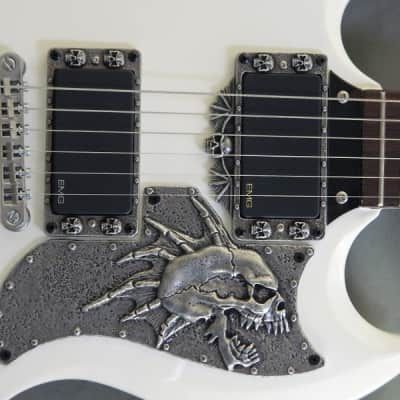 THIS AUCTION IS NOT FOR THE GUITAR OR THE OTHER PARTS PICTURED.THIS AUCTION IS ONLY FOR ONE SKULL PICKGUARD.If you are interested in the other part... Bone Guitar, Sg Guitar, Epiphone Sg, Pretty Guitars, Instruments Art, Electric Guitar Design, Guitar Obsession, Custom Electric Guitars, Cool Electric Guitars