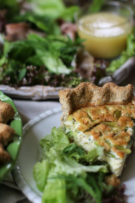 A quiche on a plate alongside springmix and dressing Green Onion Quiche, Salad For Brunch, Quiche Crust, Onion Quiche, Hosting Brunch, Enjoy The Weekend, Kitchen Cookbook, Green Onion, Dried Beans