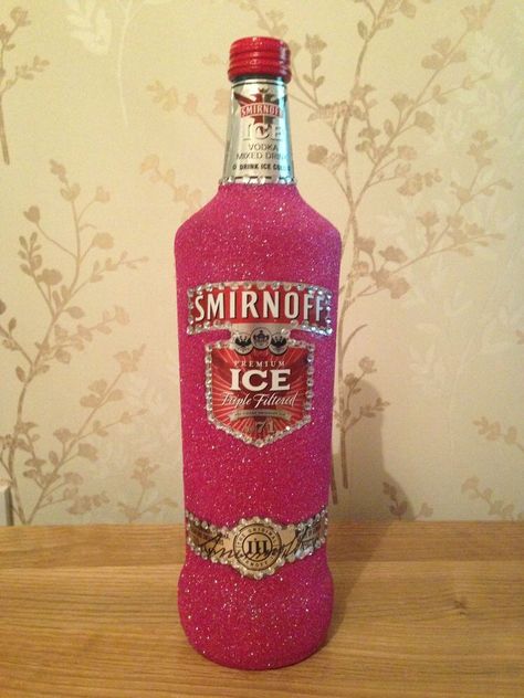 Pink Smirnoff, Glitter Bottle Diy, Smirnoff Bottle, Alcohol Bottle Decorations, Bedazzled Liquor Bottles, Bedazzled Bottle, Alcohol Bottle Crafts, Glitter Wine Bottles, Vodka Mixes