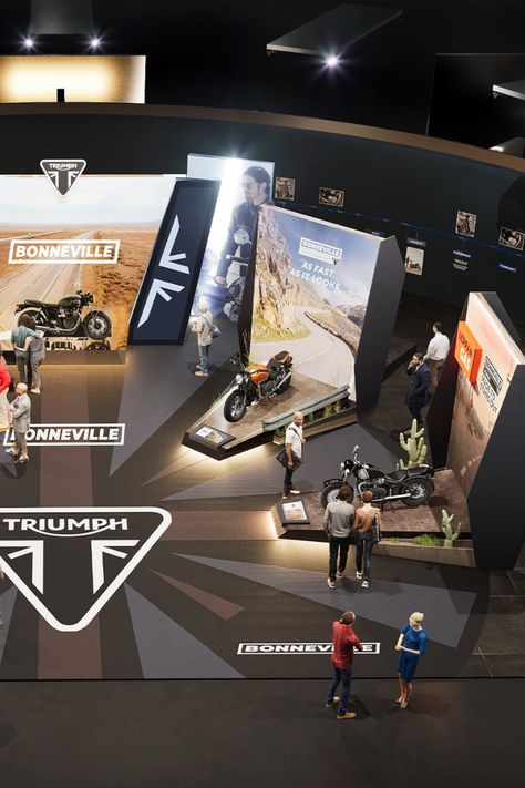 Custom exhibition stand for Triumph Motorcycles, featuring a series of themed motorbike displays. Motorcycle Booth Design, Modern Exhibition Booth Design, Bike Exhibition, Exhibition Design Booth, Motorcycle Display, Exhibit Design Inspiration, Car Exhibition, Restaurant Exterior Design, Motorcycle Store