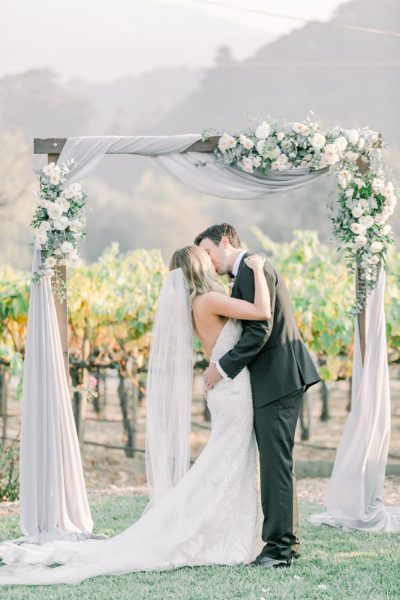 vinery wedding ceremony, outdoor ceremony spring, soft gray and blush outdoor wedding ceremony, wedding backdrop Folktale Winery, Simple Wedding Arch, Ombre Nail Design, Wedding Trellis, Wooden Wedding Arches, Fall Wedding Arches, White Wedding Arch, Wedding Arches Outdoors, Fabric Draping