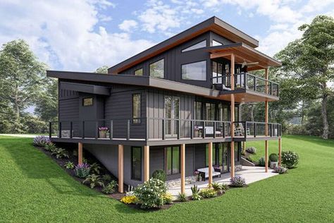 Shipment Container Homes: Where Beauty Meets Sustainability Rear Sloping House Plans, House Plans Sloping Lot, House Plans For Steep Lots, Home On Slope Design, Sloped Land House Plans, Contemporary Mountain House Plans, Contemporary Lake House Plans, Lake House On Steep Slope, House On Sloped Lot