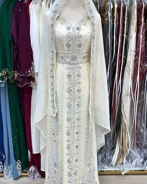 ✨ Beautiful White Bridal Abaya Dubai Kaftan ✨ 👰 Perfect for your Nikkah or special occasion! This stunning gown features intricate hand embroidery, blending elegance with tradition. Step into your big day in timeless style. 💍 Shop Now and make your bridal moment unforgettable: https://bit.ly/47TvoHW #BridalAbaya #DubaiKaftan #NikkahGown #HandEmbroidery #BridalStyle #WhiteKaftan #WeddingFashion #AfricanAttireShop Nikkah Abaya, Bridal Abaya, Full Sleeve Gowns, African Kaftan, White Kaftan, Nikkah Dress, Kaftan Abaya, Tassel Dress, Abaya Dress