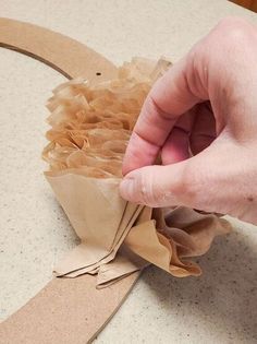 How To Make A Coffee Filter Wreath, Coffee Filter Wreath Diy, Patriot Wreaths, Cardboard Wreath, Diy Faux Rocks, Coffee Filter Garland, Brown Wreath, Shaving Cream Art, Coffee Filter Wreath