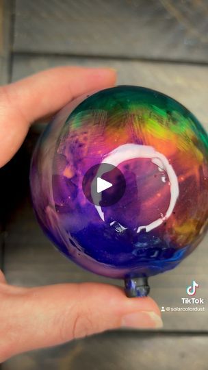 407K views · 10K reactions | DIY Mood Ring Ornament | Let's get crafty! DIY Mood Ring Ornament tutorial 😍🎄✨ | By SolarColorDust.com | Let's turn this into this. Using this, liquid crystal pure form. Using a soft brush, apply the liquid crystal to the surface of your project. A black base works best for a vibrant color change. Try the liquid crystal completely and add another coat if necessary. Once completely dry, seal it with resin. I'll be using UV resin. And check out that color change. The 12 color version of Liquistal changes colors in 12 stages between 60 and 90 degrees Fahrenheit and with such wide activation window, it will even change colors with the heat of your hands. Just like a Mood Ring. Now through November 11th, save 30% with Code Mood Paint Mood Paint, Base Words, Liquid Crystal, Pure Form, Mood Ring, Ornament Tutorial, Crafty Diy, 90 Degrees, Uv Resin