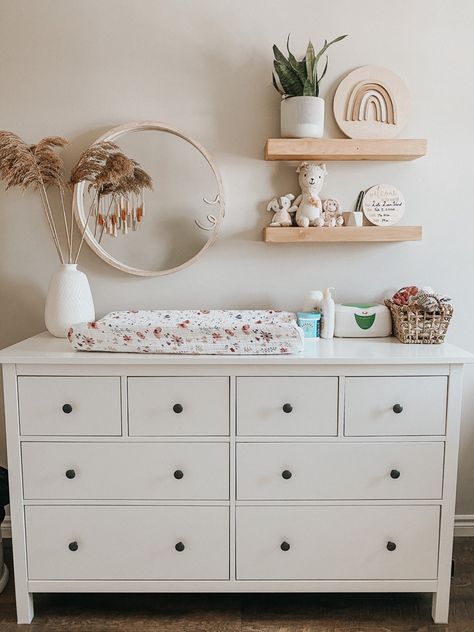 Nursery Ideas Ikea Dresser, Floating Shelf In Nursery, Hanging Plant In Nursery, H&m Nursery, Boho Nursery Dresser Decor, Hemnes Drawers Nursery, Ikea Change Table Hack, Shelves Above Dresser Nursery, Above Nursery Dresser Decor