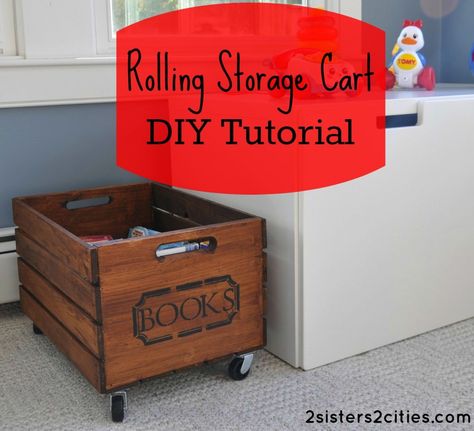 Rolling Storage Crate DIY Tutorial- make this cart for less than thirty dollars!  Similar versions of this storage cart cost 3 times as much in high-end children's catalogs.      Great for storing books and toys!    This could work for other areas in the home as well. Crate Bookshelf, Crate Diy, Storage Crate, Rolling Storage Cart, 2 Sisters, Rolling Storage, Storage Cart, Crate Storage, Book Storage