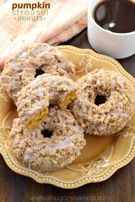 This delicious Pumpkin Streusel Donuts recipe is baked, not fried. The brown sugar streusel and cinnamon glaze are perfect on these moist donuts! Pumpkin Devotion, Pumpkin Zucchini Bread, Canned Pumpkin Recipes, Pumpkin Streusel, Cinnamon Glaze, Baker's Rack, Savory Pumpkin Recipes, Pumpkin Recipes Easy, Shugary Sweets