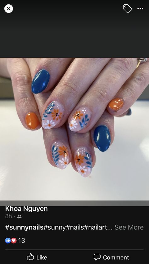 Blue And Orange Nail Art, Blue And Orange Flower Nails, September Nails Blue, Teal And Orange Fall Nails, Dark Blue And Orange Nails, Blue Fall Nail Ideas, Navy Blue And Orange Nails, Navy And Orange Nails, Orange And Teal Nails