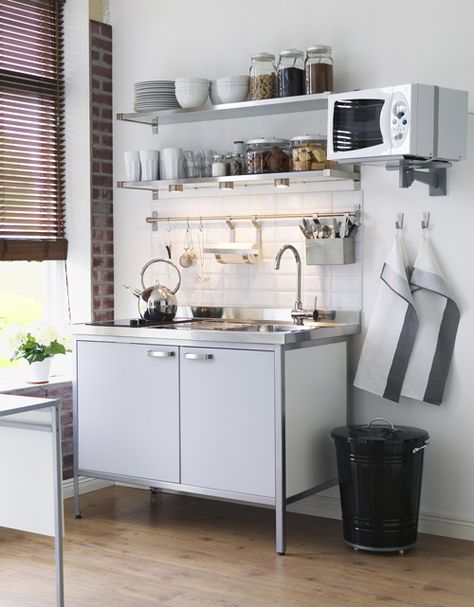 Freestanding modules are perfect for unfitted kitchens and can be taken with you if you move. They can be used in kitchens and utility rooms and can often make a small space feel larger, creating the illusion of space as the eye is drawn to the floor area beneath the unit. Ikea's Attityd 120cm-wide mini-kitchen in white and light grey includes a single-bowl sink, mixer tap, two-zone ceramic hob and fridge and costs £650 Unfitted Kitchens, Small Sinks, Ikea Small Spaces, Unfitted Kitchen, Small Kitchenette, Kitchen Grey, Dark Wood Kitchens, Small Apartment Kitchen, Portable Kitchen