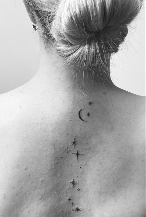 black and white picture of a spinal moon and star tattoo Stars On Spine Tattoo, Black And White Spine Tattoos, Spine Constellation Tattoo, Stars Down Spine Tattoo, Night Sky Back Tattoo, Night Sky Tattoos For Women, Galaxy Spine Tattoo, Moon And Stars Spine Tattoo, Spine Tattoo Stars