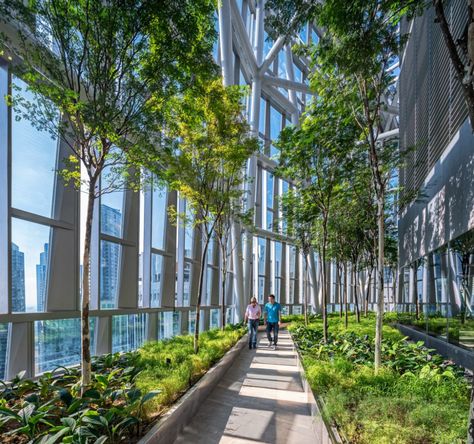 The rooftop garden features a path that runs around the perimeter of the tower, providing dramatic views out to the city below.