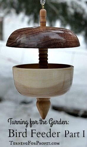 Turned Bird Feeders Finished and waiting for the birds.  Combines both spindle and bowl turning to produce a stunning wooden bird feeder.  Part I shows you how to turn the central dowel for the feeder. Wooden Bird Feeders, Bowl Turning, Wood Turning Lathe, Lathe Projects, Shop Projects, Wood Turner, Diy Holz, Wood Turning Projects, Wooden Bird