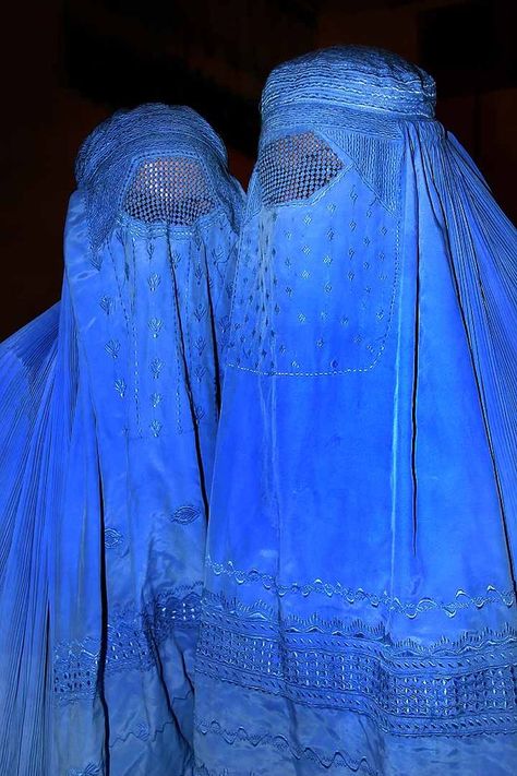 Afghan women wearing shuttlecock burqas, the most concealing of all Islamic veils. It covers the entire face and body, leaving just a mesh screen to see through. Hijab Niqab, Mother Wedding, Blue Theme, We Are The World, Step Mother, People Of The World, Niqab, Hijab Style, Ravenclaw