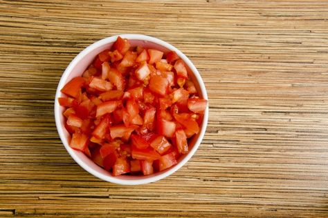 Dicing tomatoes by hand can be a slow, laborious process especially if you have a lot of tomatoes to dice. A food processor is the perfect kitchen appliance that will do the job for you in a fraction of the time. The key to using a food processor for diced tomatoes is to use the pulse feature of ... Petite Diced Tomatoes Recipes, Freezer Diced Tomatoes, How To Make Diced Tomatoes To Freeze, Dice Tomatoes How To, Food Processor Salsa Fresh Tomatoes, Canned Stewed Tomatoes, Canned Diced Tomatoes, Kitchenaid Food Processor, Food Processor Uses