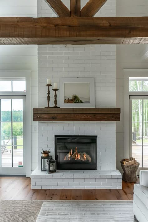 40 Farmhouse Fireplace Ideas for a Charming Home Hearth Off Center Fireplace Ideas Living Rooms, Tall Brick Fireplace, Fireplace With Hearth And Mantle, Fireplace Wood Mantle, Winter House Interior, Fireplace Hearth Ideas, Farmhouse Fireplace Ideas, Porter House, Farmhouse Fireplace Mantels