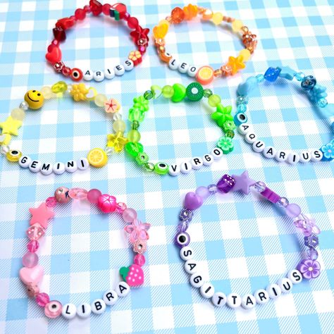 BEADS BRACELETS #BeadedBracelets Star Sign Beaded Bracelets, Clay Bead Bracelet Zodiac, Bracelet Ideas With Evil Eye, Mismatched Beaded Bracelet, Zodiac Sign Beaded Bracelets, Zodiac Sign Clay Bead Bracelets, Festival Bead Bracelets, Cute Words To Put On Beaded Bracelets, Zodiac Sign Bracelet Clay Beads