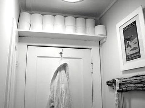 toilet paper storage. I'd close it as a cabinet to aver spiders. Apartment List, Pretty Storage, Eclectic Bathroom, Toilet Paper Storage, Small Bathroom Makeover, Door Shelves, Bathroom Idea, Tiny Bathrooms, Small Bathroom Storage